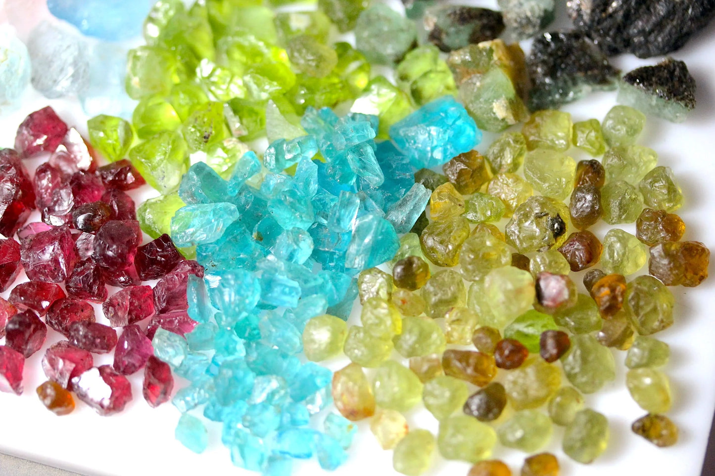 1262 Carat Mixed Gemstone Rough Parcel- Emeralds, Beryls, Garnets, Peridot, Apatite