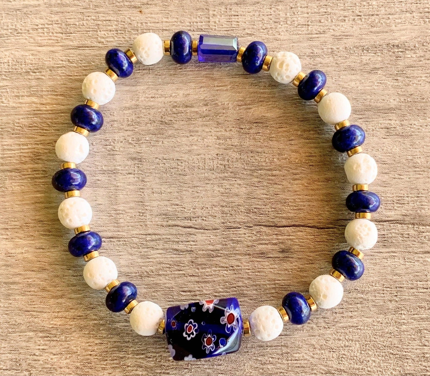 Nisha Handmade Lapis Lazuli, White Lava Stone, Gold Plated Hematite, Austrian Crystal, and Millefiori Bracelet - Born Mystics