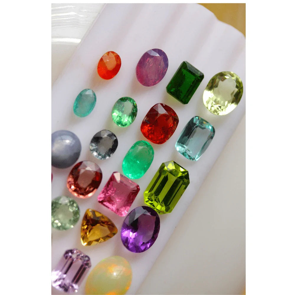 21 Pieces Multi Loose Cut Gemstones: Emerald, Ruby, Sapphire, Garnet, Aqua, Tourmaline