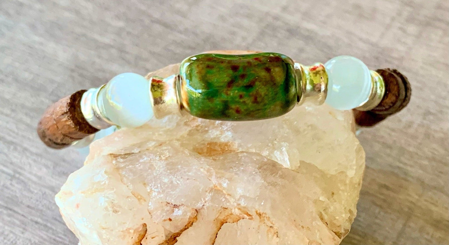 Nino Handmade Wood, Cats Eye, and Austrian Crystal Expandable Bracelet with a Ceramic Center Piece - Born Mystics