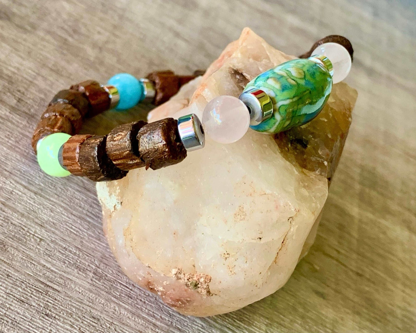 Edward Handmade Wood, Rose Quartz, Light Green Jade, Aquamarine, and Hematite Expandable Bracelet with a Ceramic Center Piece